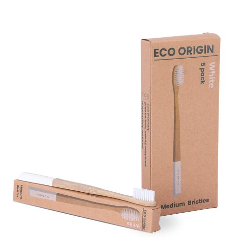 Eco Origin bamboo toothbrush 5-pack with white medium bristles. The image shows the eco-friendly toothbrush in sustainable packaging, emphasizing its biodegradable bamboo handle and environmentally conscious design. Eco Origin bamboo toothbrush 5-pack with white medium bristles. The image shows the eco-friendly toothbrush in sustainable packaging, emphasizing its biodegradable bamboo handle and environmentally conscious design.